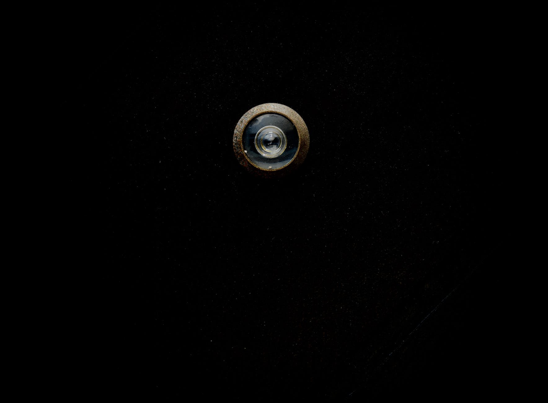 peephole on black door